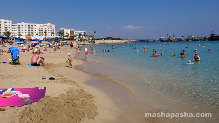Shallow clear warm sea, yellow sand are the main advantages of Sunrise beach — Sunrise Protaras Beach, Cyprus