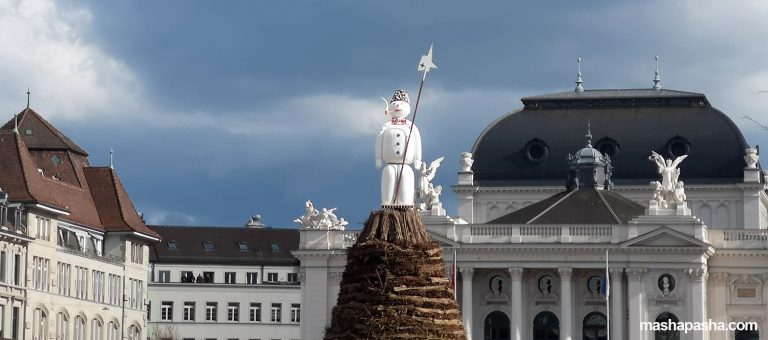 A stuffed snowman on a bonfire on Sechseläutenplatz near the theater — Sechseläuten Carnival, Zürich, Switzerland