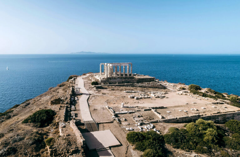 Temple of Poseidon and sunsets over the sea, Greece