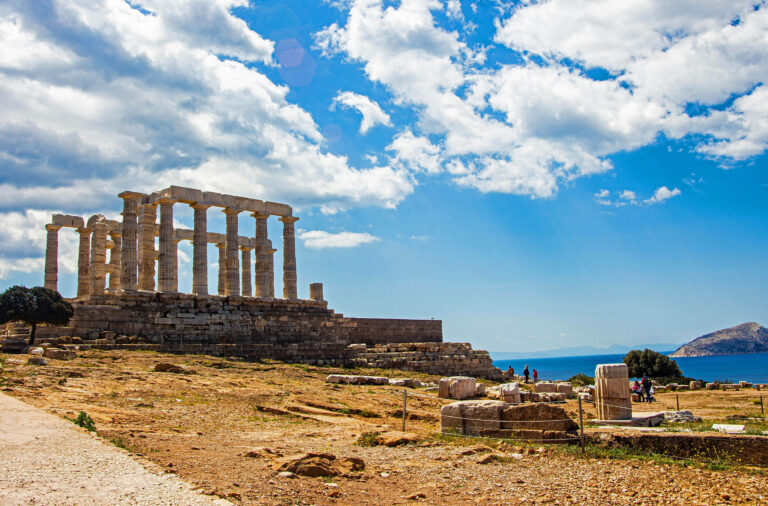 Temple of Poseidon and sunsets over the sea, Greece